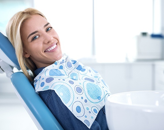 Smiling woman in dental chair | Teeth Cleaning and Whitening | Best Dentist Andover MA 01810