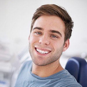 Smiling man in dental chair | Teeth Whitening and Cleaning | Best Dentist Andover MA 01810