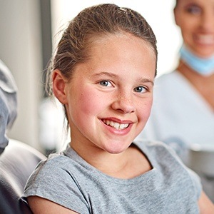 Smiling little girl in dental chair | Fluoride Treatment | Pediatric Dentist Andover MA 01810