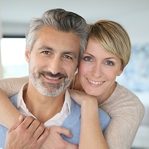 Smiling older man and woman