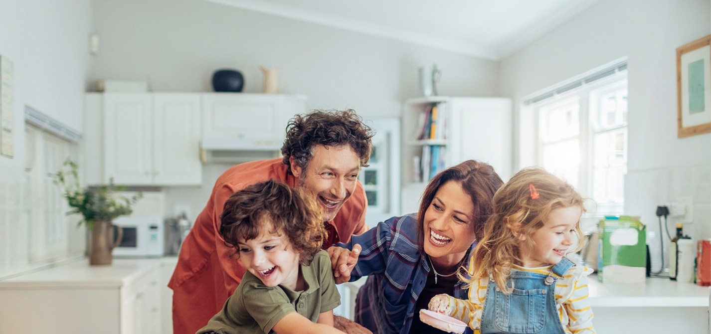 Smiling family of four